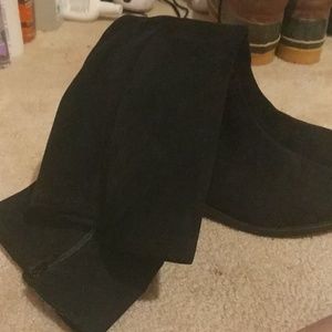 Tall black boots